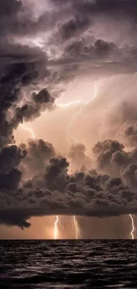 Experience the awe-inspiring power of nature with this stunning live wallpaper! Under a dramatic cloudy sky, a large body of water captivates the eyes, while lightning strikes in different directions, illuminating the entire scene