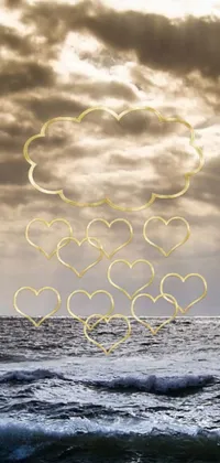 This stunning live phone wallpaper showcases a group of floating hearts over a calm body of water