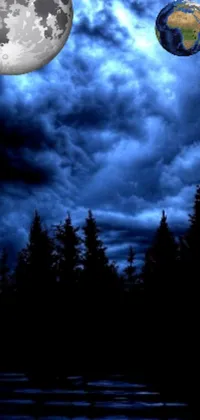 This phone live wallpaper features a full moon, silhouetted pine trees, and stormclouds in the background
