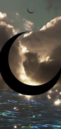 This live wallpaper depicts a crescent moon shining over a peaceful body of water under a cloudy sky