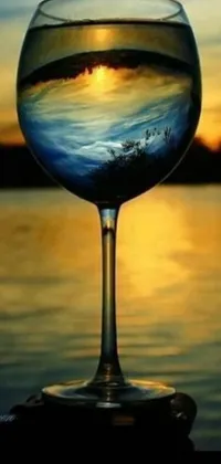 This live wallpaper depicts a stunning and tranquil scene consisting of a wine glass on a table, a photorealistic painting, and surreal elements