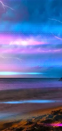 Looking for a stunning live phone wallpaper that evokes the power and beauty of nature? Look no further than this amazing beach scene! The picture captures an incredible thunderstorm, with lightning flashing across the sky and illuminating the beach