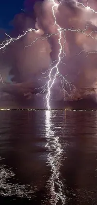 Elevate your phone's wallpaper game with this stunning live wallpaper featuring a group of lightning flashes over a body of water