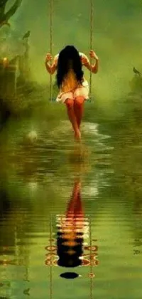 A stunning live phone wallpaper featuring an Indian goddess-like girl on a swing over glittering green water