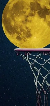 This live wallpaper features a basketball hoop with a full moon in the background, perfect for sports lovers and anyone who enjoys the beauty of a nighttime scene