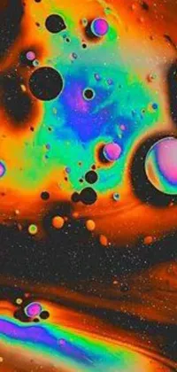The live wallpaper for your phone showcases a display of floating colorful bubbles in varying shades of red, blue, green, yellow, and pink