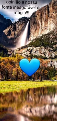 Enhance your mobile aesthetics with this beautiful blue heart live wallpaper, adorned atop a lush green field background in stunning detail