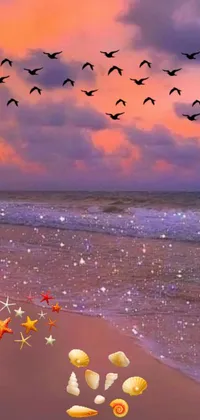 This ocean-inspired phone live wallpaper features a group of birds flying over a sandy beach at sunset
