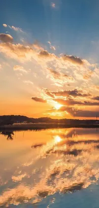 This beautiful phone live wallpaper showcases a serene sunset reflected on a calm river