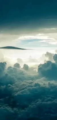 Looking for an awe-inspiring live wallpaper for your phone? Look no further than this surreal airplane high above the clouds imagery, featuring a beautiful cumulus cloud tattoo effect
