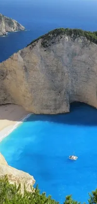 Discover a breathtaking phone live wallpaper featuring a serene body of water with a small boat, framed by majestic chalk cliffs