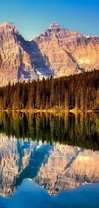 This phone live wallpaper is a serene depiction of a body of water with a mountain and forest in the background