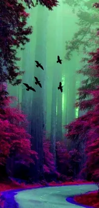 This phone live wallpaper delivers a visual masterpiece with a group of birds gracefully soaring over a scenic forest