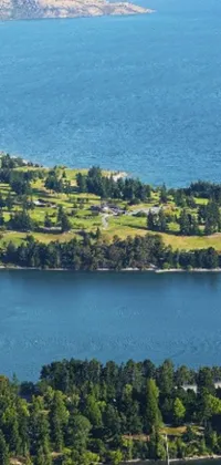 This mobile live wallpaper captures the peacefulness of a small island surrounded by vast water in British Columbia