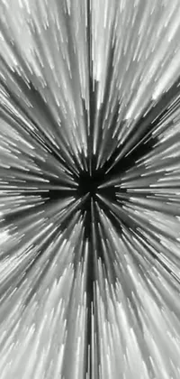 This live phone wallpaper showcases a black and white microscopic photo of a burst of light, giving it a minimalist feel