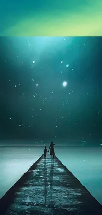 This live phone wallpaper showcases a tranquil winter night on a pier