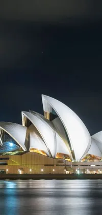 This phone live wallpaper depicts the iconic and beautifully illuminated Sydney Opera House at night