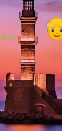This phone live wallpaper showcases a serene lighthouse next to a body of water against a blue sky
