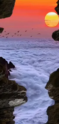 This stunning phone live wallpaper showcases a surrealistic matte painting by Liu Haisu, featuring a breathtaking sunset over a sea of clouds