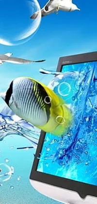 This live wallpaper for your phone features a sleek computer monitor on a modern desk against an underwater bubble background