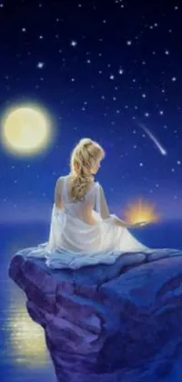 This captivating live wallpaper features a serene woman gazing at the moon while seated on a rock