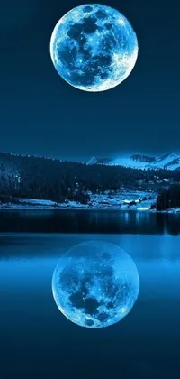 This phone live wallpaper depicts a mesmerizing digital art of a full moon rising over a calm body of water, surrounded by blue liquid and snow