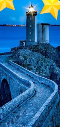 This mobile phone live wallpaper showcases a breathtaking image of a majestic lighthouse standing tall on a rocky cliff, overlooking the serene ocean