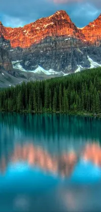This phone live wallpaper showcases a stunning impressionism style landscape, featuring a serene lake and majestic mountain range backdrop