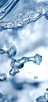 Transform your phone's wallpaper with this mesmerizing live wallpaper of water with bubbles