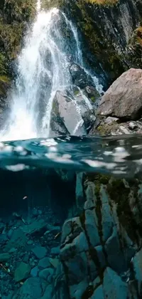This phone live wallpaper features a stunning, hyperrealistic waterfall in the middle of a body of water
