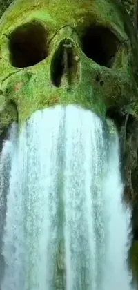 This incredible live wallpaper features a large green skull atop a cascading waterfall