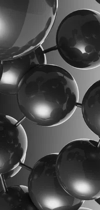 This mobile live wallpaper showcases a stunning black and white photograph of spheres styled in an ambient occlusion effect