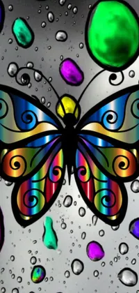 This phone live wallpaper features a magnificent butterfly sitting upon bubbles in a dazzling, colorful display