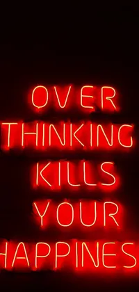 This dynamic phone live wallpaper features a stunning neon sign reminding viewers of the dangers of excessive thinking and its negative impact on happiness