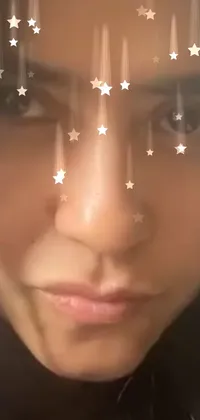 This phone live wallpaper features a breathtaking close-up of a starry forehead