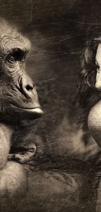 This phone live wallpaper showcases a captivating black/white portrait of a woman and a gorilla