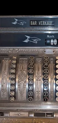 This live wallpaper features a vintage silver cash register on a wooden table juxtaposed with a close-up of a ship control panel
