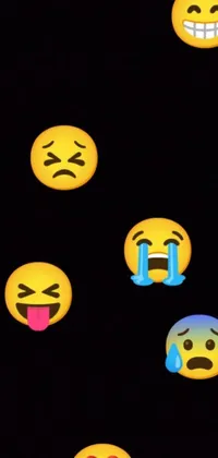 This live wallpaper features an array of emoticons against a black backdrop on your smartphone