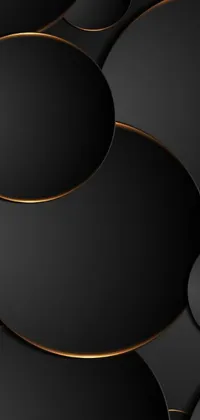 This phone live wallpaper features a sleek and modern design with black and gold circles arranged on a black background
