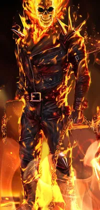 Spice up your phone with a fiery live wallpaper featuring a man and motorcycle engulfed in flames