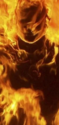 This phone live wallpaper showcases a menacing and dark design of a person on fire