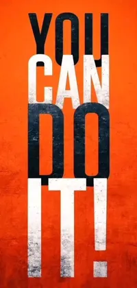 This live phone wallpaper features an eye-catching orange poster with the motivational words &quot;you can do it&quot; printed in bold white letters