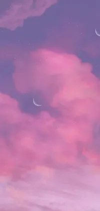 Enhance the look of your phone with this pink sky live wallpaper featuring two crescent moons