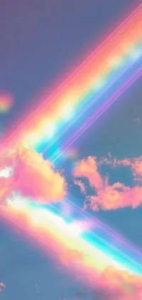 This phone live wallpaper features a beautiful image of a rainbow in the sky with a holography effect, creating a stunning 3D optical illusion that will capture your attention