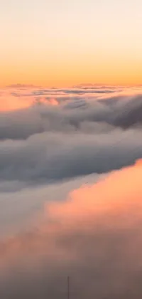 This live wallpaper presents a magnificent spectacle of a power line amidst a sea of clouds