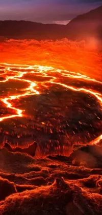 This mesmerizing phone live wallpaper features a stunning matte painting of a vast desert with a deep, fiery crater at its center