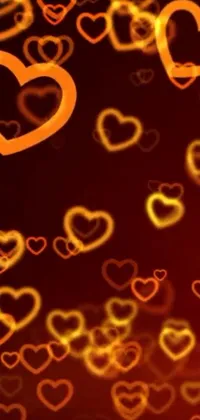 This phone live wallpaper features a fantastic display of orange and yellow hearts floating in the air, creating a stunning visual screensaver for your device