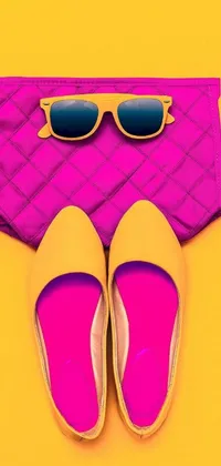 Make a statement with this amazing live wallpaper featuring a pair of yellow shoes and a pink purse