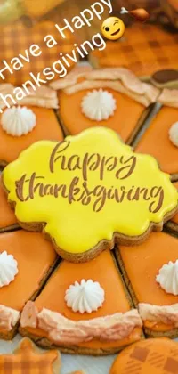 This live wallpaper depicts a plate of cookies with a "happy thanksgiving" sign