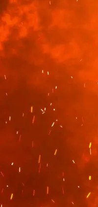 This vivid phone live wallpaper showcases two airplanes elegantly flying against a vivid red sky, featuring breathtaking fire particles and captured using an extreme 8k close-up shot